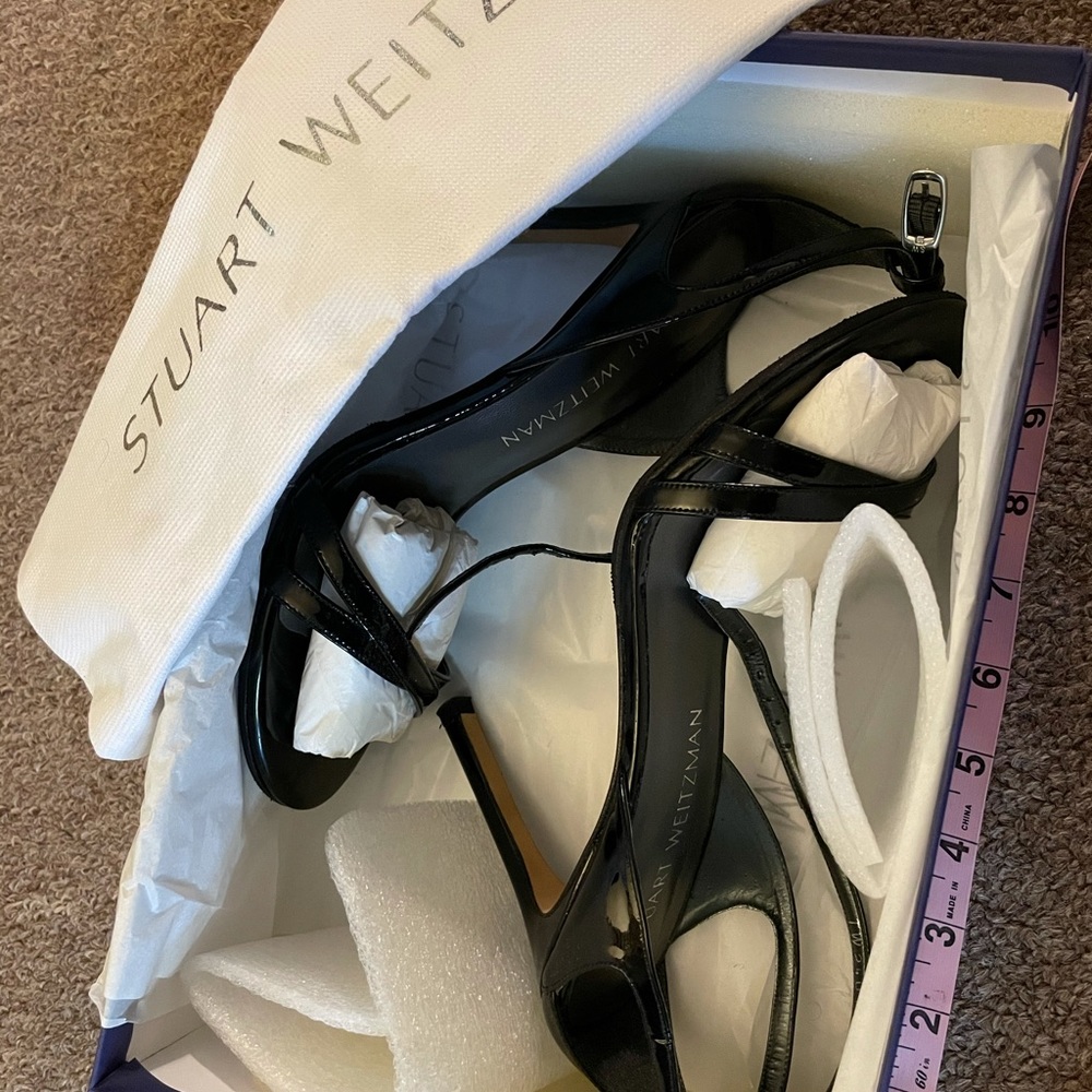 Black, patent leather high heels.